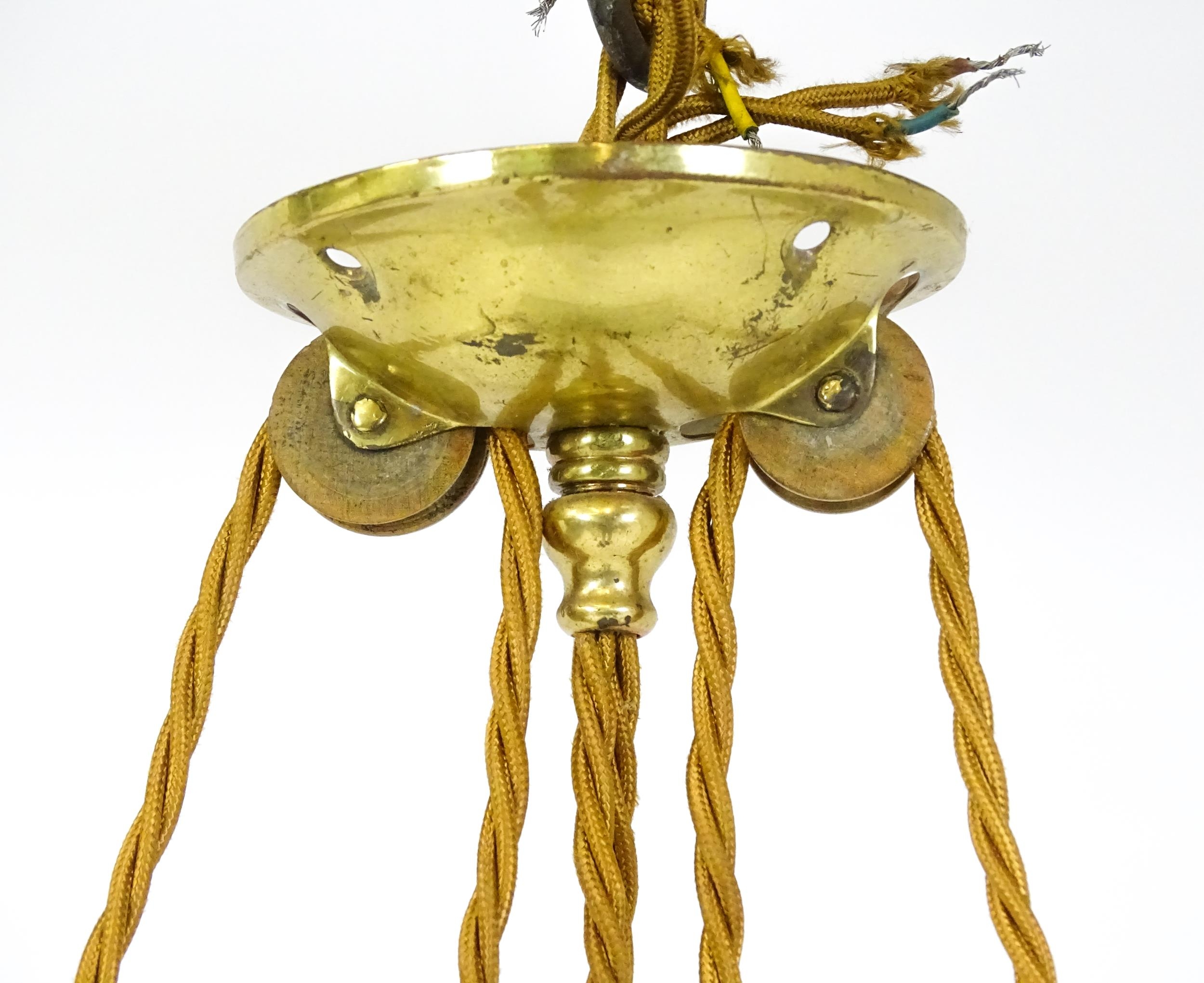 An early 20thC rise and fall adjustable height pendant light with with brass detail and twin frosted - Image 4 of 10