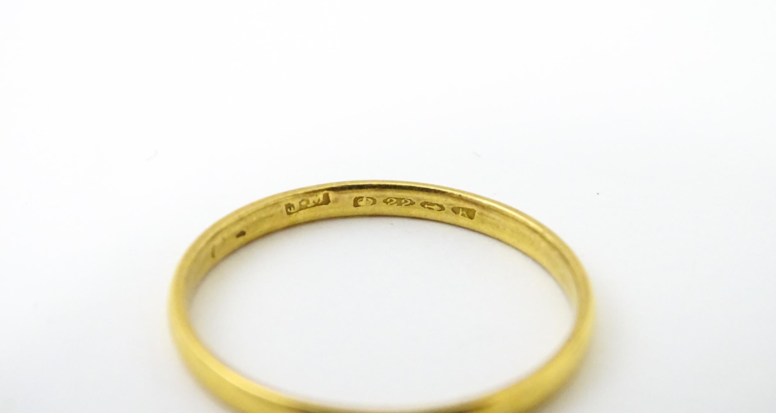 A 22ct gold ring. Ring size approx. Y. (2.9g approx) Please Note - we do not make reference to the - Image 2 of 5