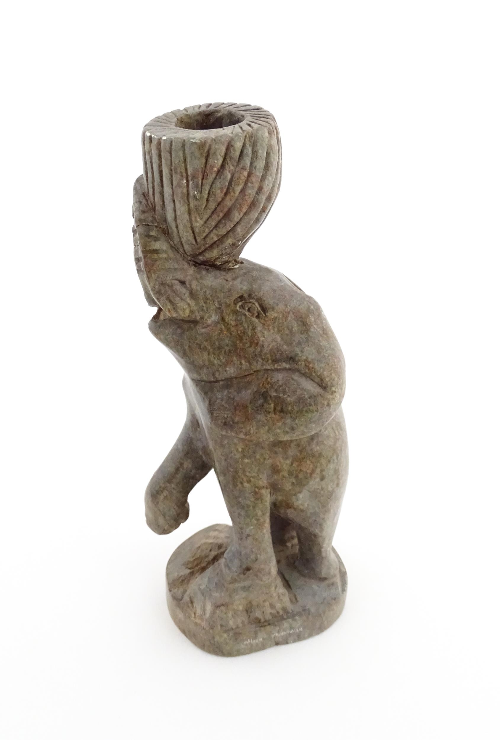 Ethnographic / Native / Tribal : An African carved soapstone candlestick formed as an elephant - Image 2 of 8