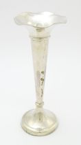 A silver vase hallmarked Chester 1912, maker Barker Brothers. Approx. 10" high Please Note - we do