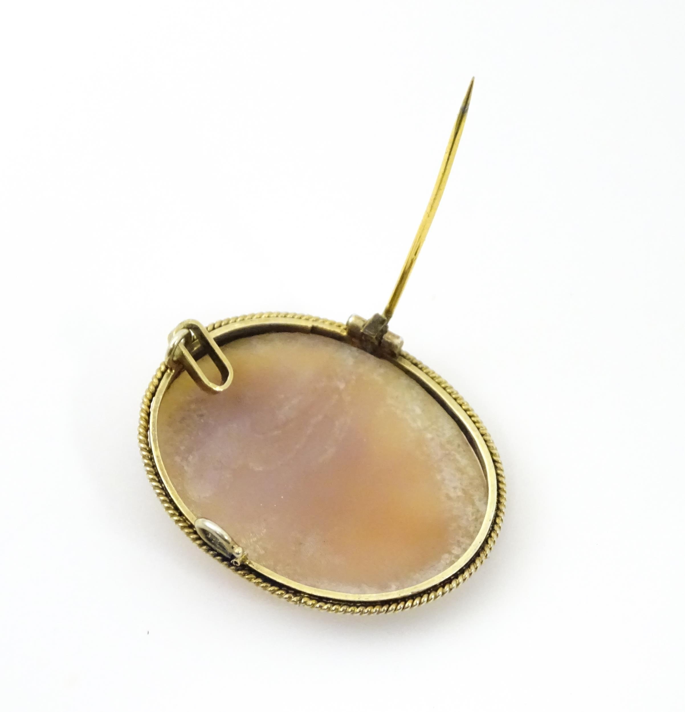 A brooch / pendant set with Classical cameo in a yellow metal mount. Approx. 1 1/2" long Please Note - Image 6 of 7