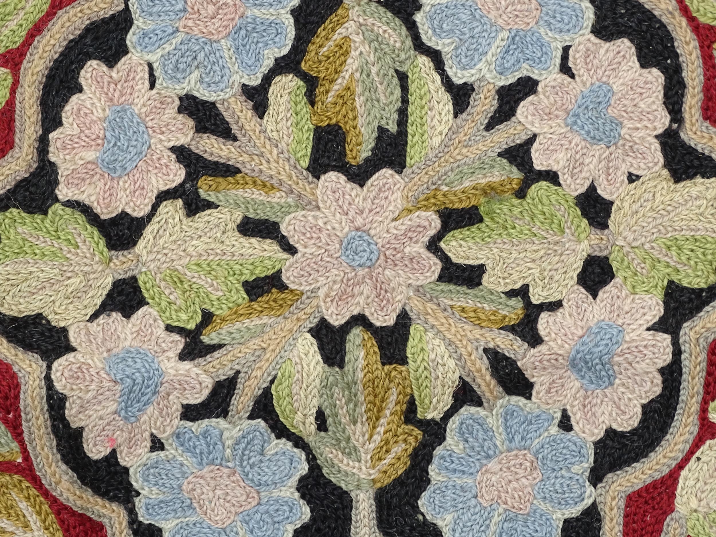 Carpet / Rug : A black and red ground rug with floral and foliate detail. Approx. 35" x 24 1/2" - Image 5 of 7