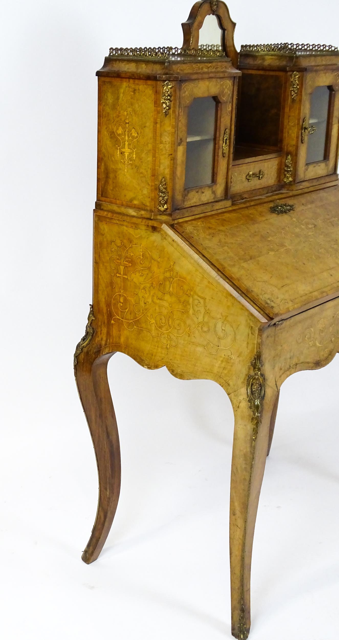 A 19thC burr walnut Bonheur du jour with a mirrored back stand and flanked by two glazed cabinets - Image 3 of 11