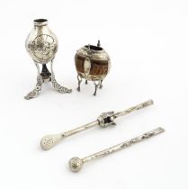 A mate pot with gourd / seed pod body and silver plate mounts with bird and foliate detail, with a