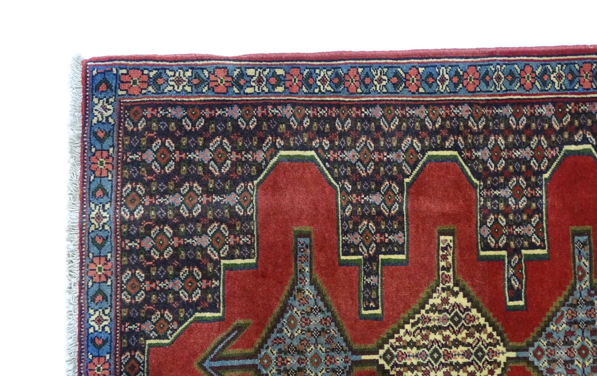 Carpet / Rug : A North West Persian Senneh runner with a red ground decorated with central repeating - Image 4 of 9