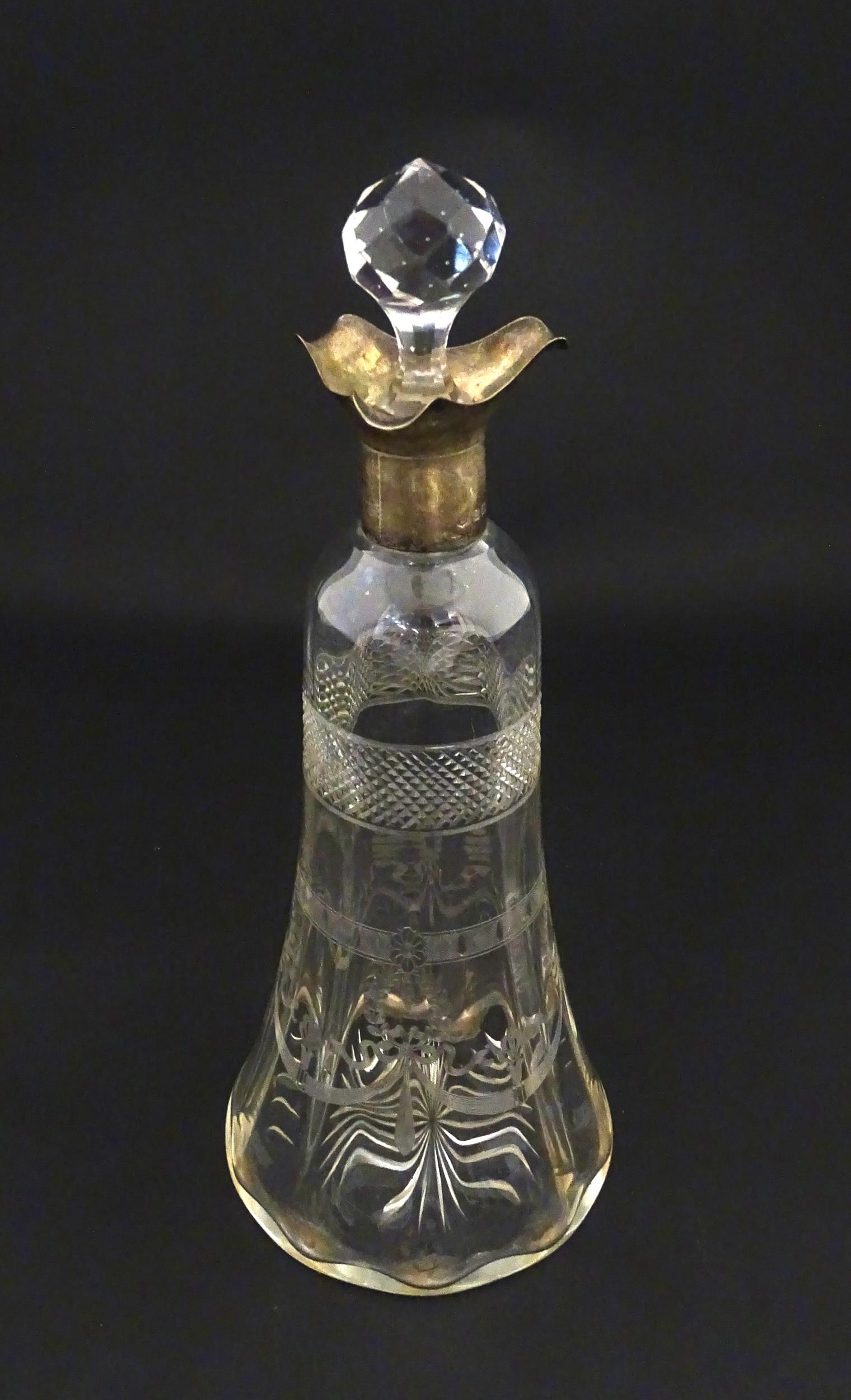 A cut glass decanter with silver mounts hallmarked Birmingham 1911. Approx. 9 1/4" high Please - Image 7 of 9