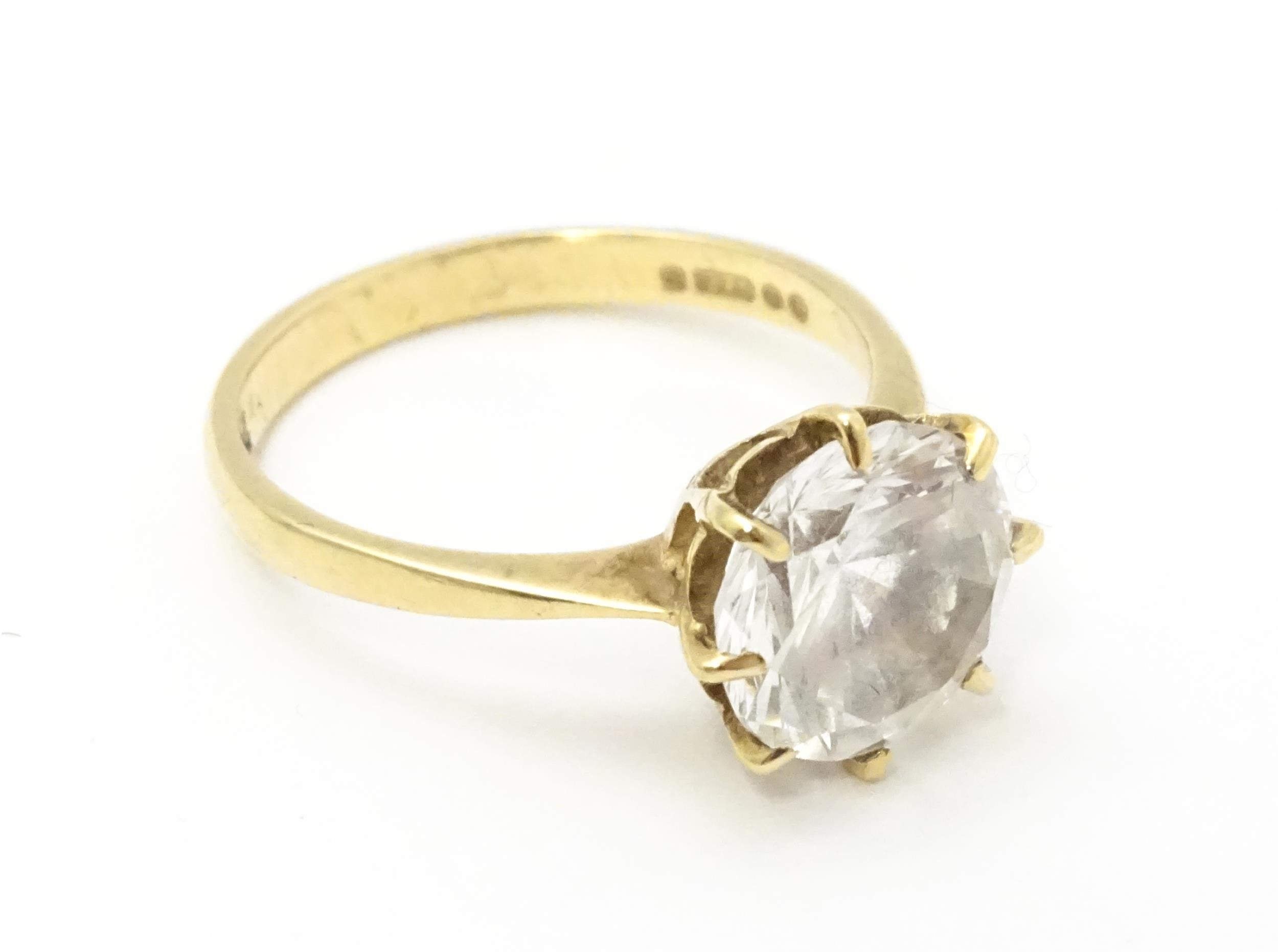 A 9ct gold ring set with a white stone solitaire. Ring size approx. O Please Note - we do not make - Image 4 of 7