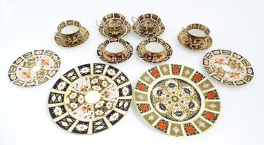 A quantity of Royal Crown Derby tea wares decorated in the Imari palette to include plates, tea