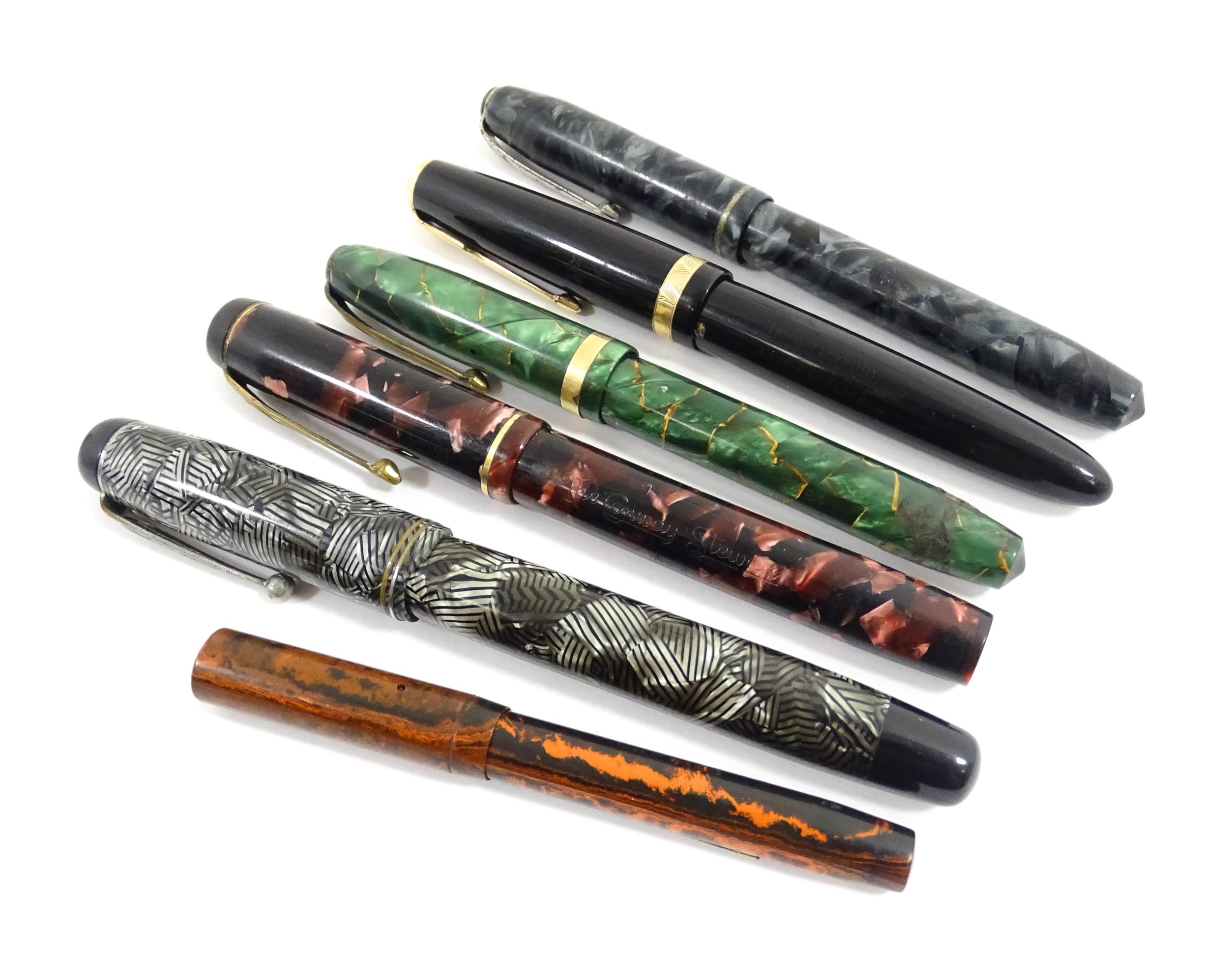 Six fountain pens with 14ct nibs, to include a Parker 'Duofold' with black finish and 14kt gold nib,