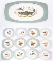 A quantity of Norwegian Figgjo Flint plates and serving plate with fish decoration. Marked under