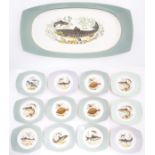 A quantity of Norwegian Figgjo Flint plates and serving plate with fish decoration. Marked under