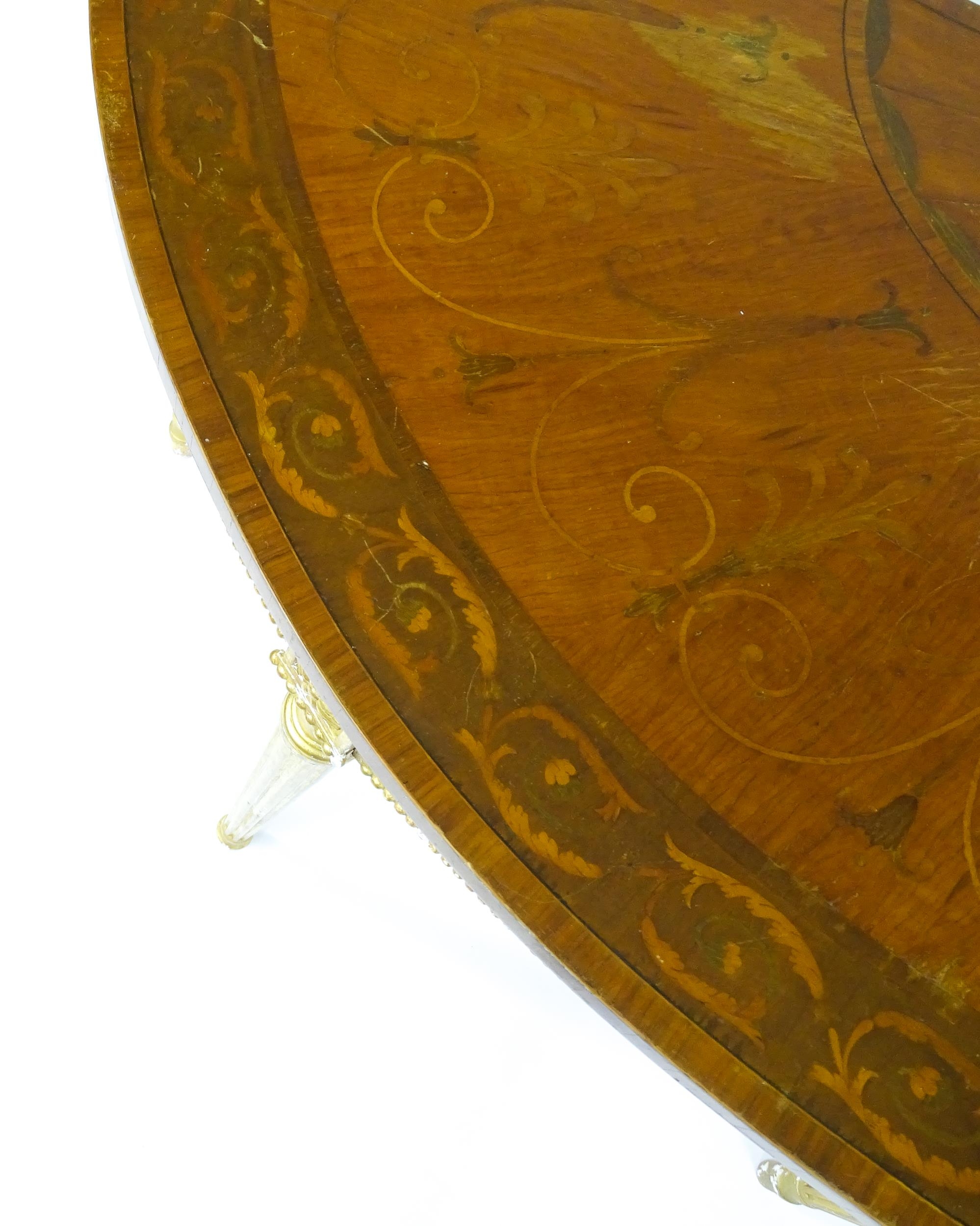 A demi lune console table with a marquetry inlaid top above a fluted frieze and moulded floral - Image 6 of 11