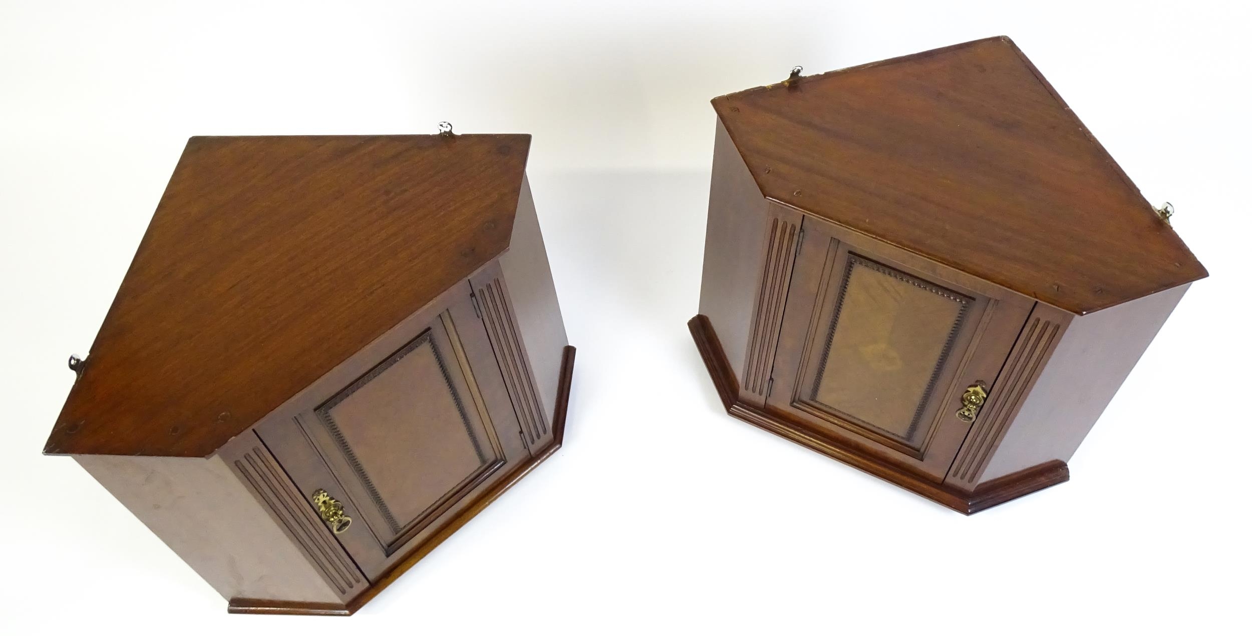 A pair of mid 20thC walnut corner cabinets. Bearing labels to back panels. 21 1/2 high x 26" wide - Image 5 of 7