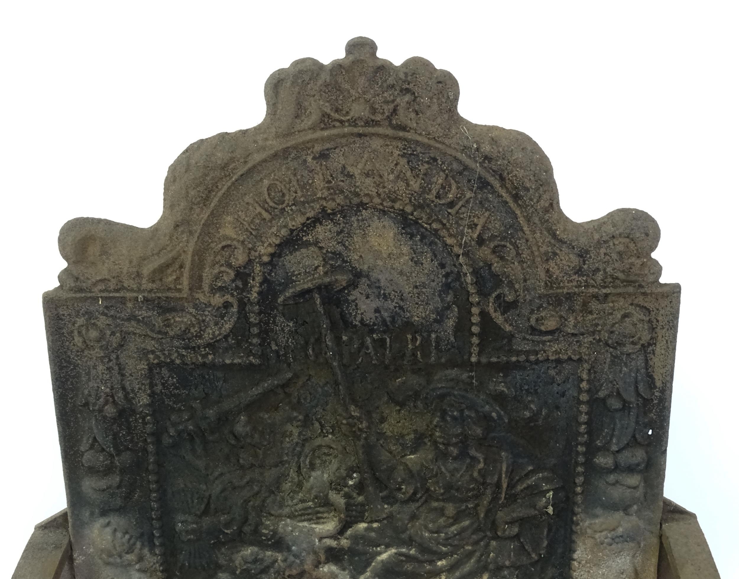 A large cast iron fire basket, the back decorated with figure and lion, marked 'Hollandia Pro - Image 8 of 18