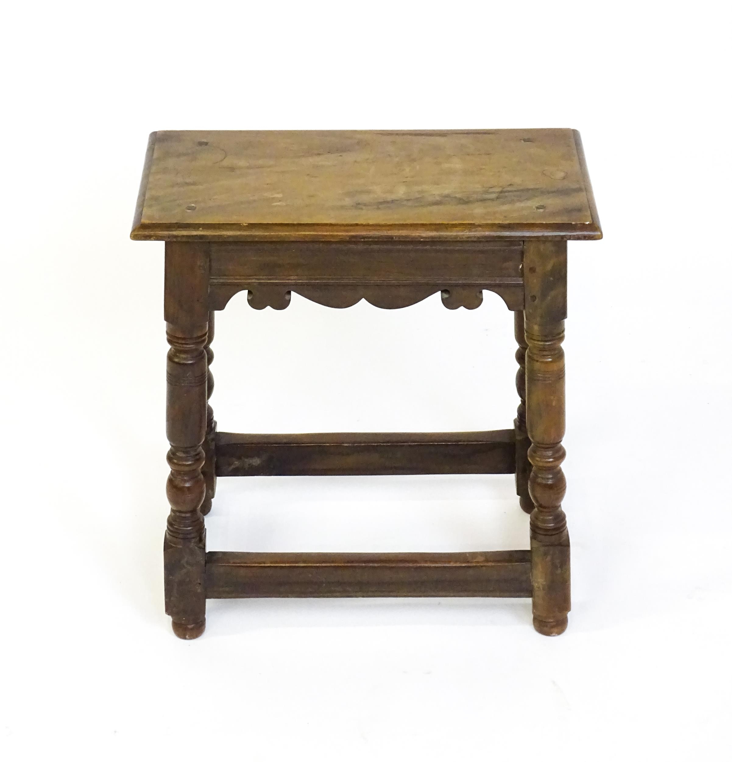 A 19thC walnut join stool of peg jointed construction, with a rectangular top above a moulded - Image 2 of 6