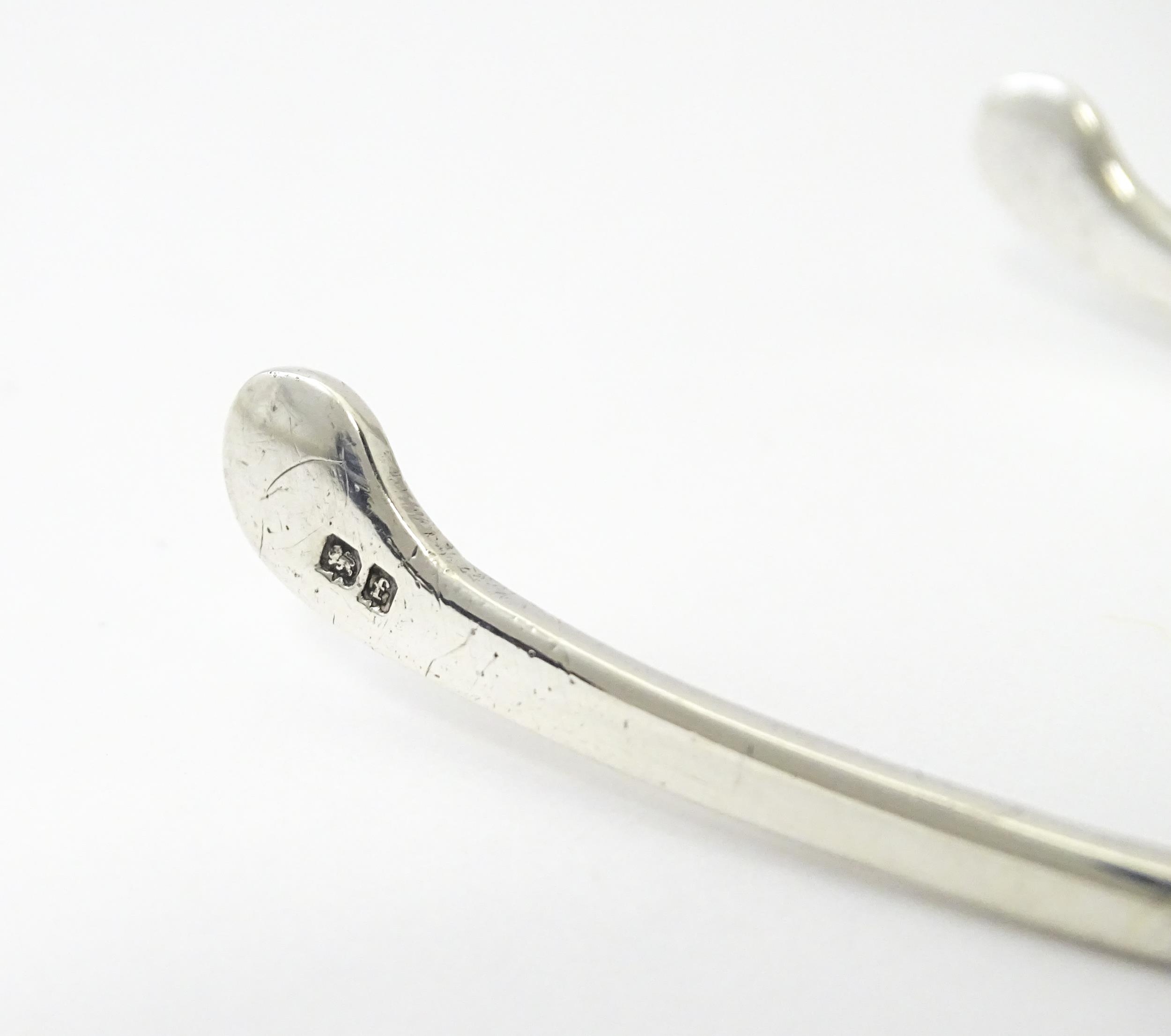 Silver tongs of wishbone form hallmarked Birmingham 1903 maker Levi & Salaman. Approx. 4" long - Image 5 of 7