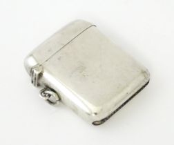 A silver vesta case hallmarked Birmingham1922 , maker A & J Zimmerman Ltd. Approx.1 3/4" long Please