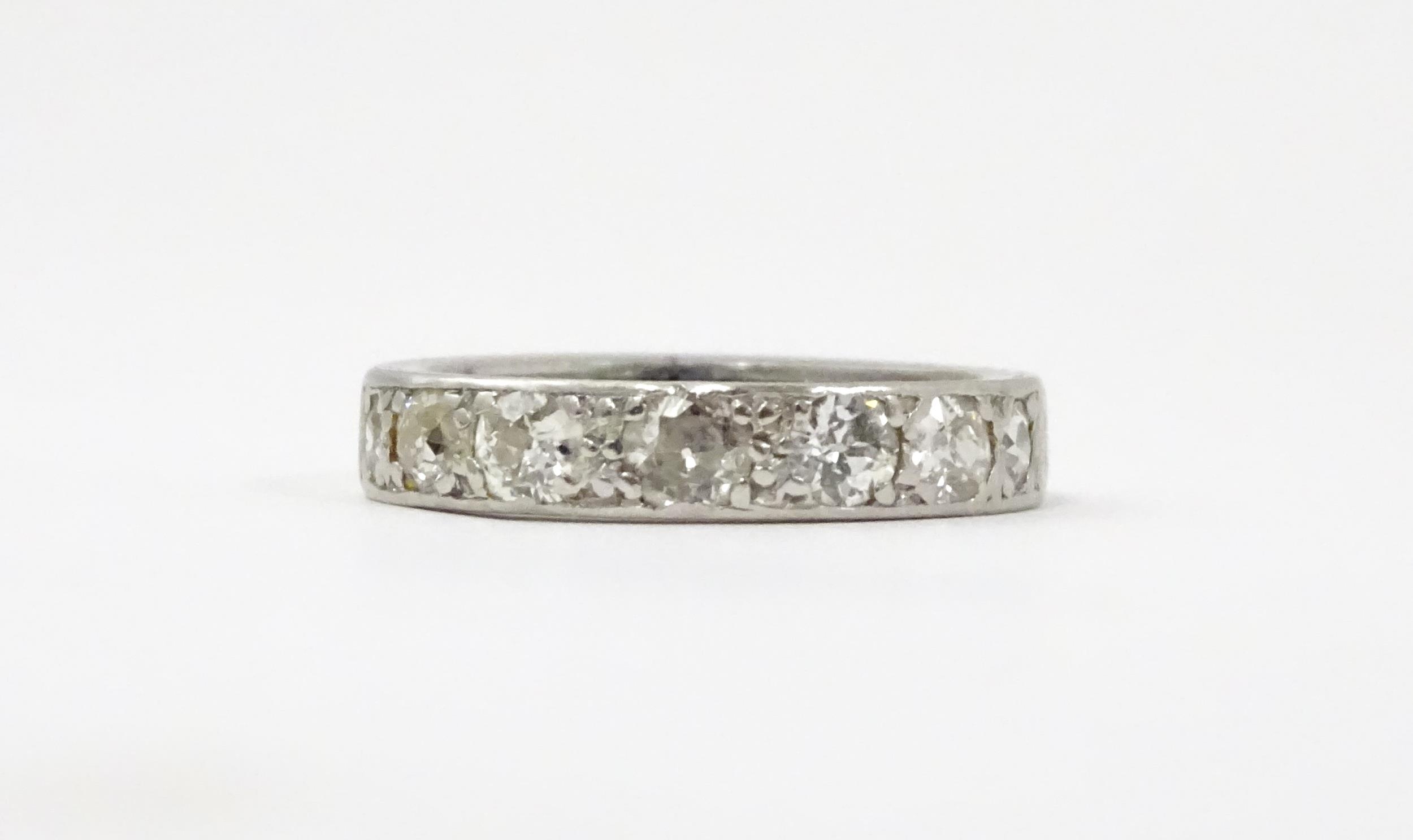 A diamond half eternity ring set with 7 diamonds. Ring size approx. L Please Note - we do not make - Image 5 of 9