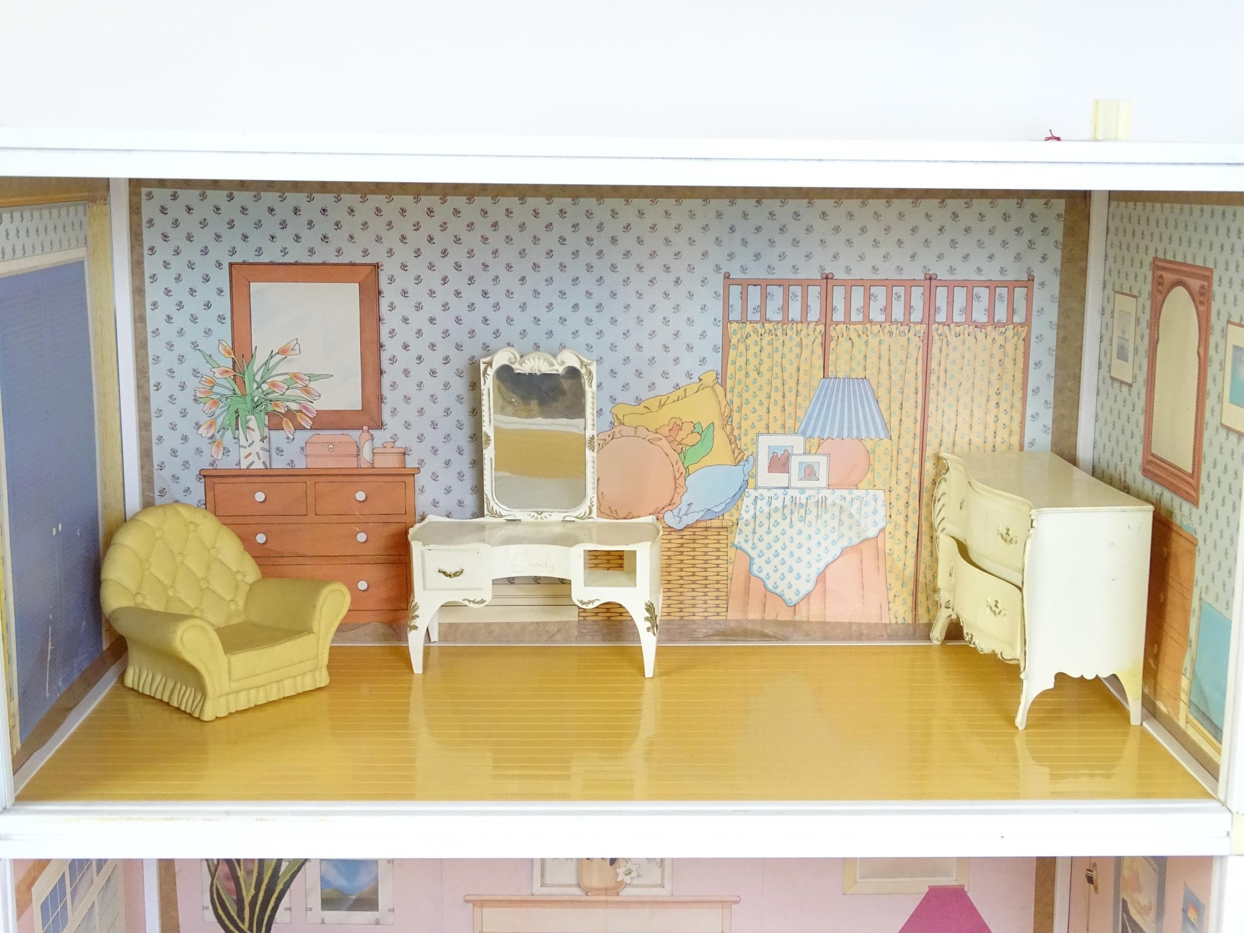 Toys: A 20thC Sindy three storey dolls house with open front, with Sindy furniture to include - Image 3 of 21