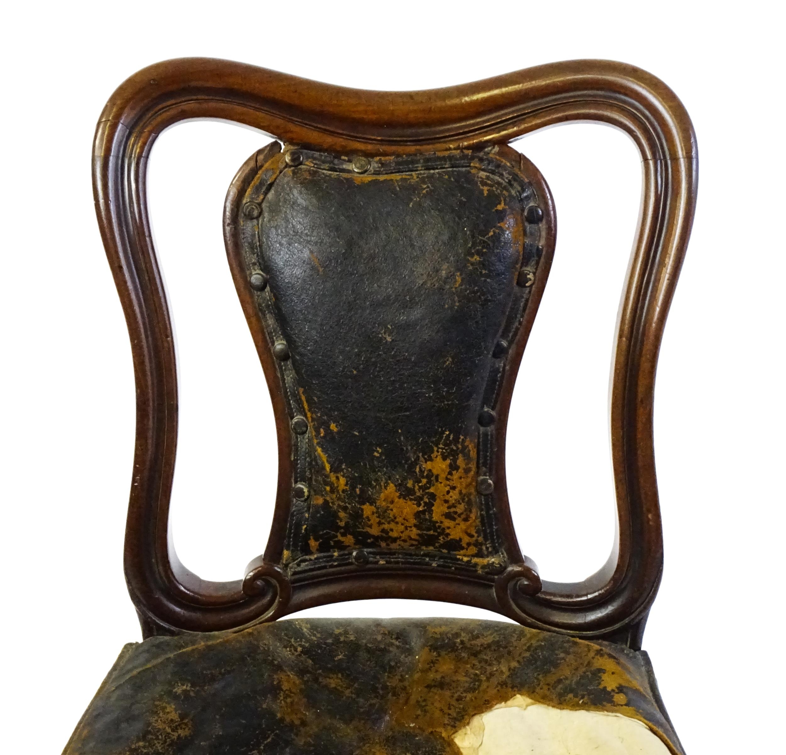 A 19thC mahogany side chair with a moulded and shaped backrest, vase shaped back splat and a leather - Image 2 of 6