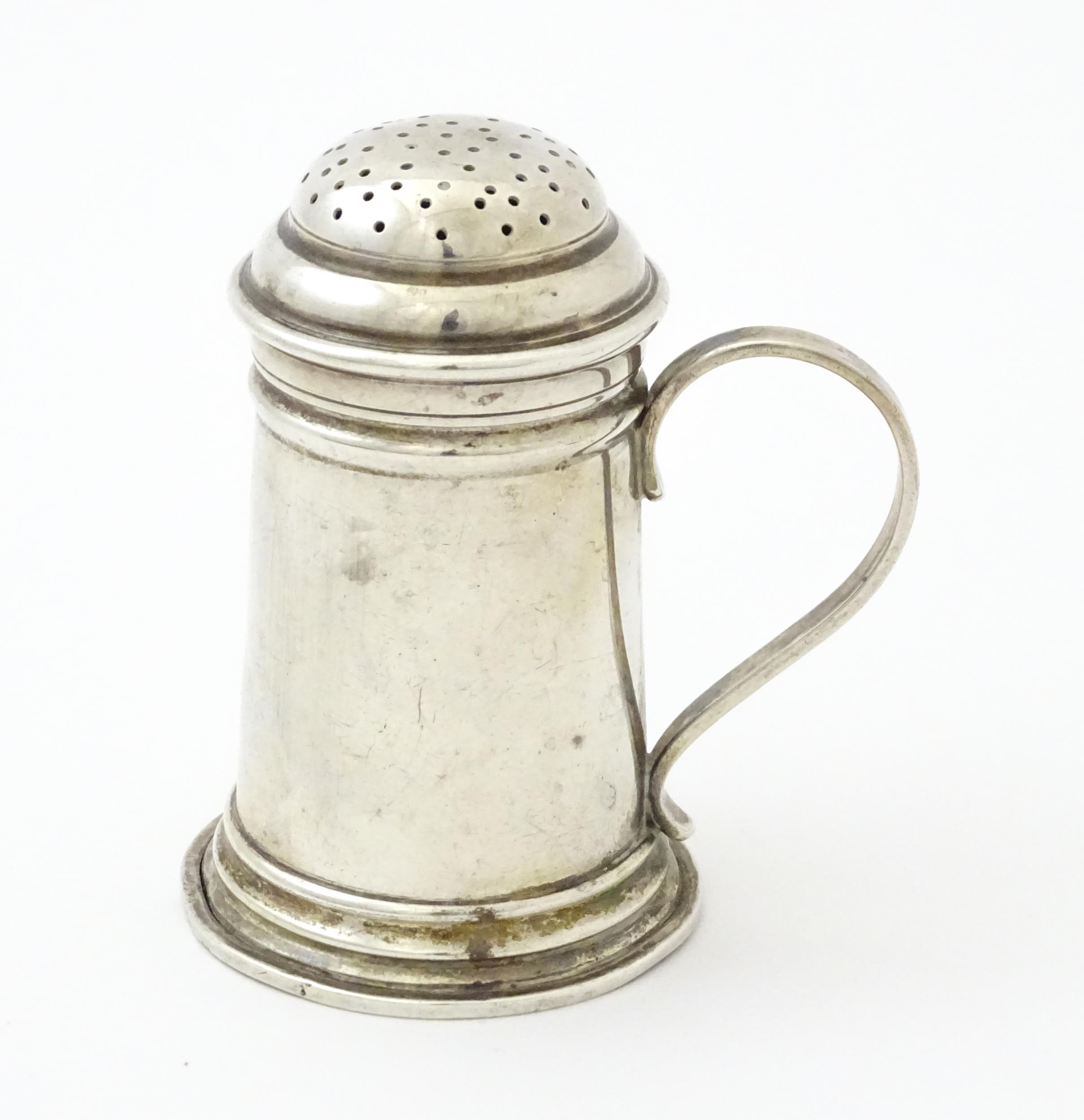 An American sterling silver pepperette modelled as a flour shaker. Marked under Georg Jensen Inc, - Image 4 of 8