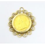 Coin A Victoria 1897 gold sovereign, Melbourne Mint, mounted within a 9ct gold captive pendant