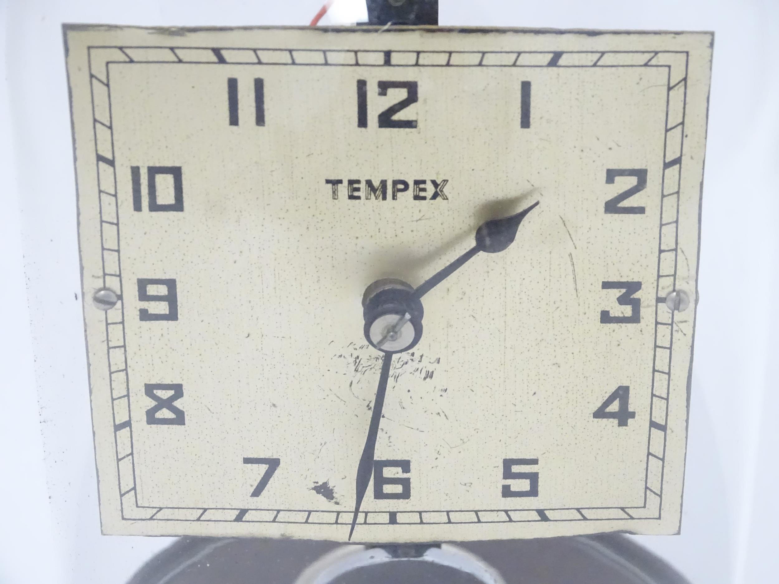 A Tempex electric clock mounted on a Bakelite base with chrome fitting. The squared dial with Arabic - Image 3 of 13