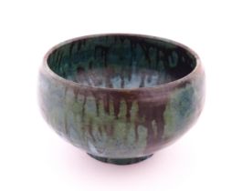 A studio pottery bowl with drip glaze. Signed under R. Berrisford, 1959. Approx. 4 1/2" high