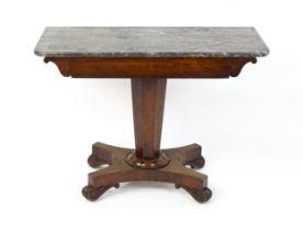 A 19thC marble topped side table with a canted pedestal above four scrolled feet. 38" wide x 17"