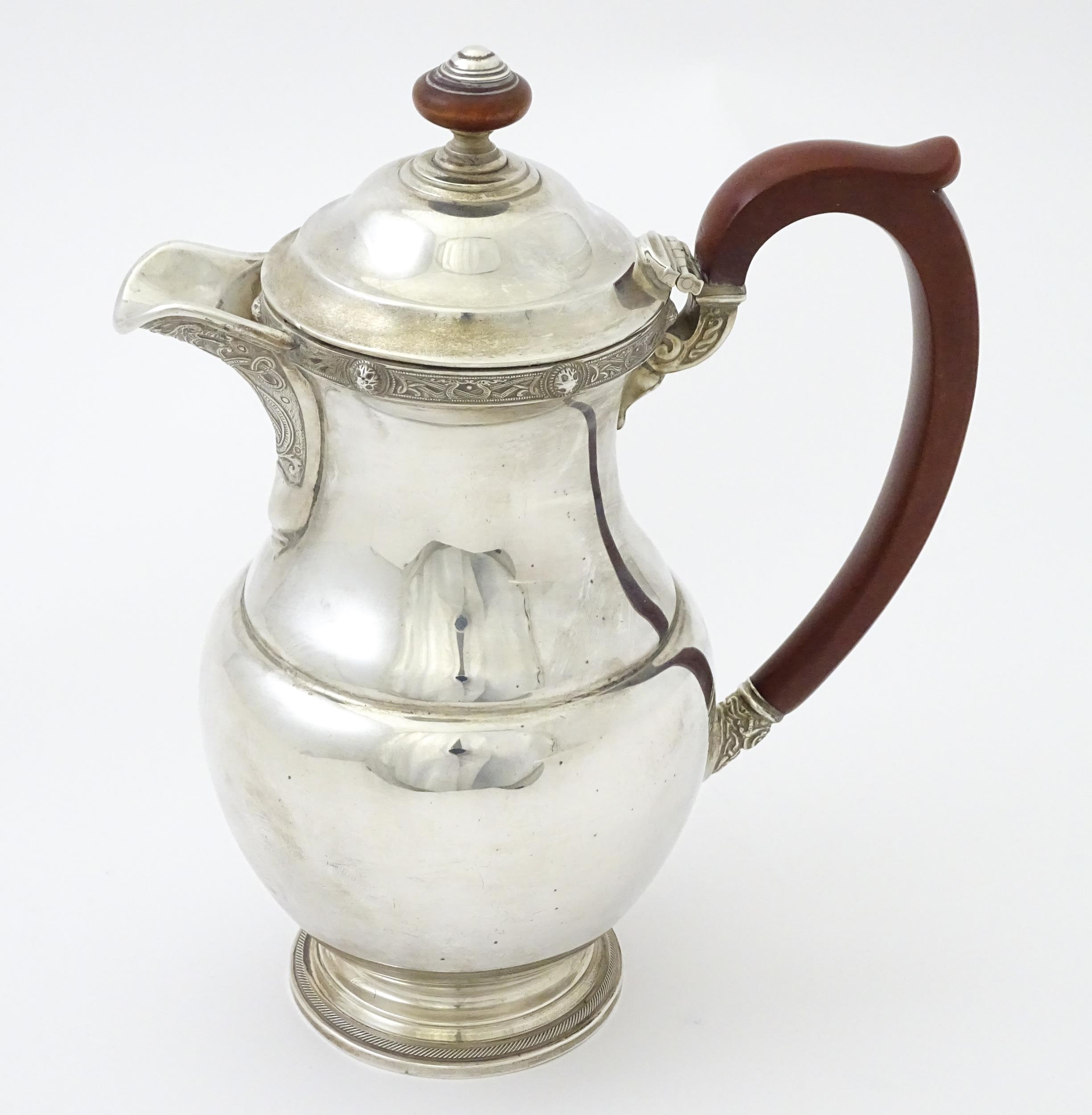 A three piece silver tea set comprising teapot, hot water pot and cream jug, with Celtic style - Image 11 of 20