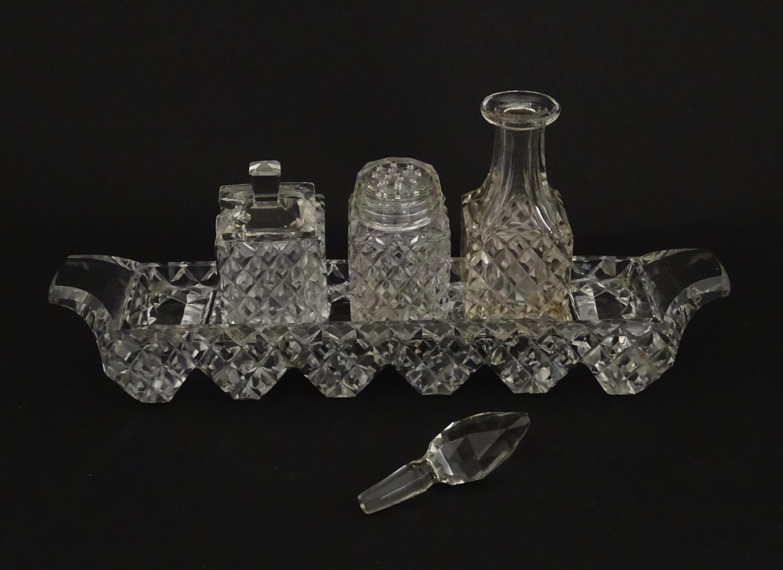 Assorted glass items to include eleven knife rests, cruet, and candle stands of pricket form by - Image 6 of 15
