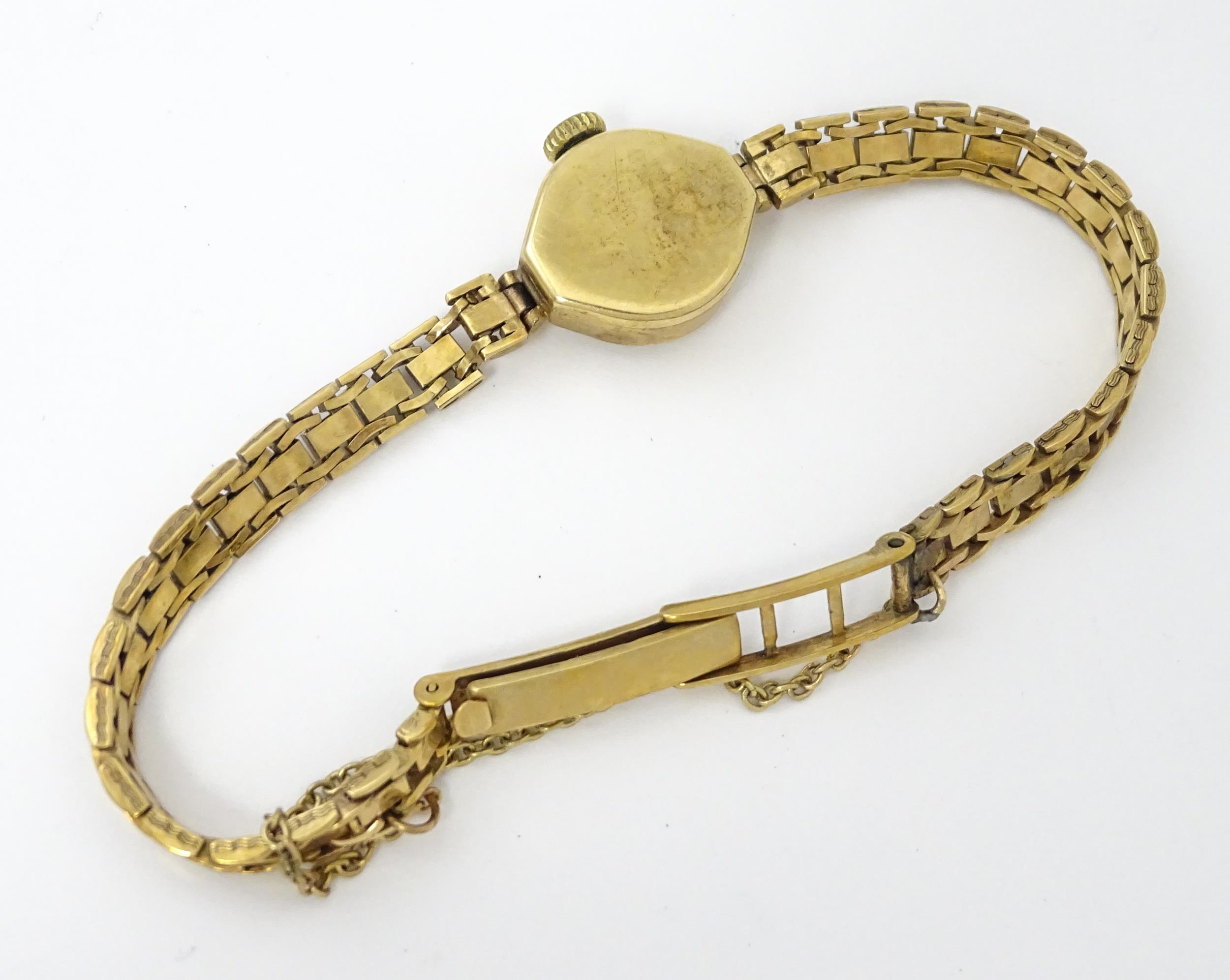A 9ct gold cased ladies wristwatch by Rotary with 9ct gold bracelet strap . Approx 1/2" wide - Image 2 of 13