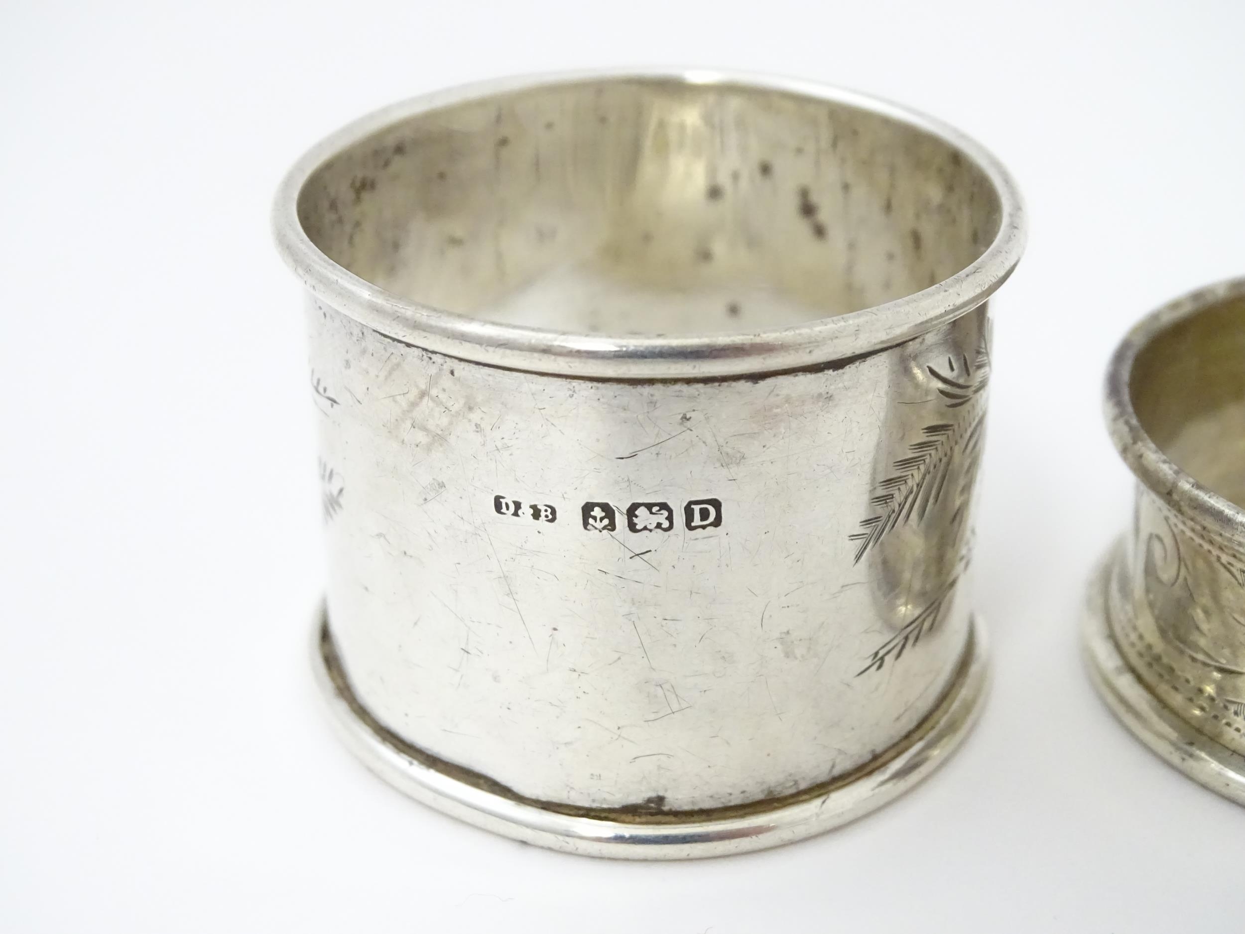 Two silver napkin rings with engraved foliate decoration, one hallmarked Birmingham 1928 maker - Image 5 of 8