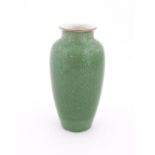 A Chinese vase with a green crackle glaze. Approx. 10 1/4" high Please Note - we do not make