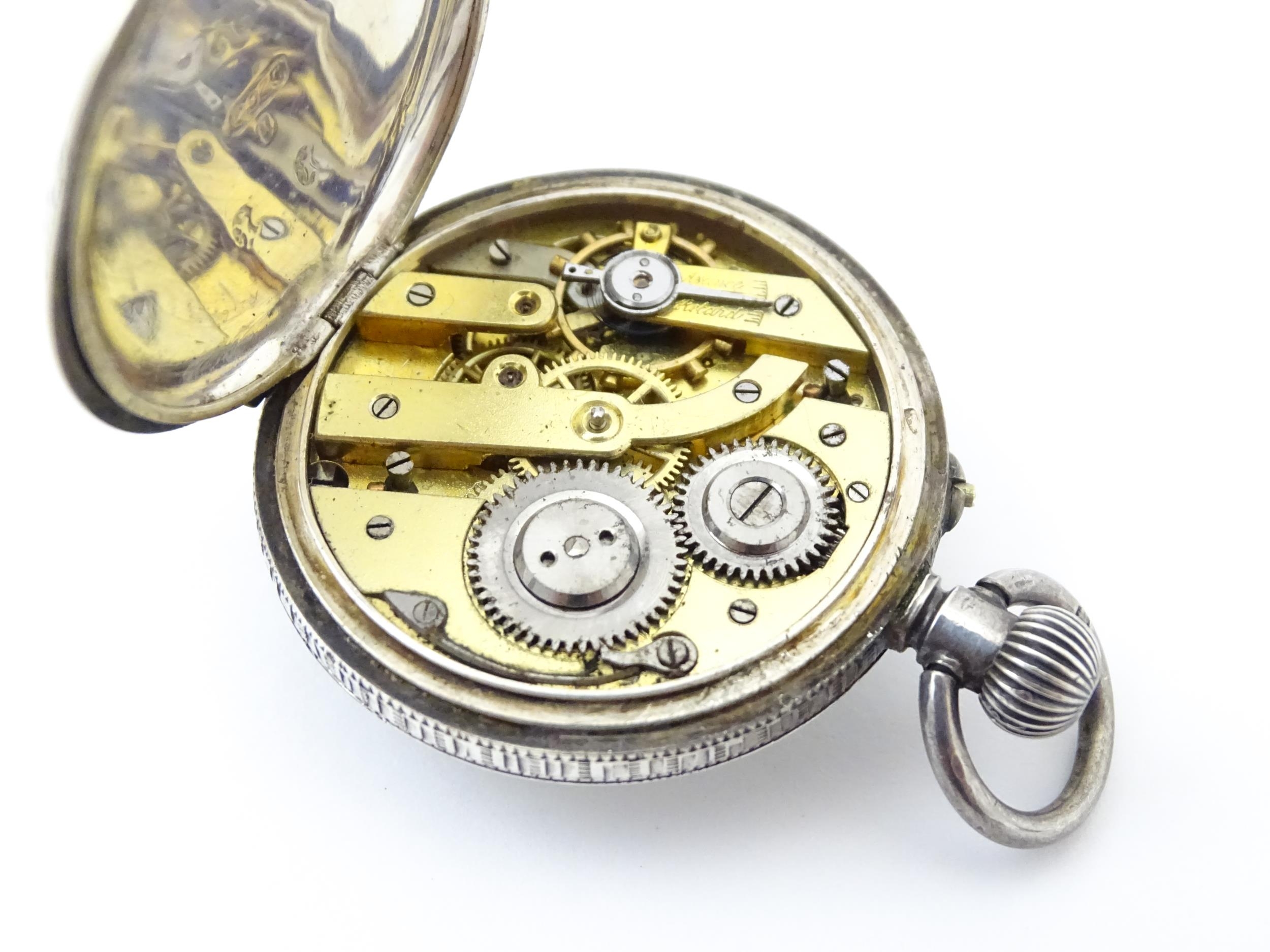 A Swiss silver cased pocket / fob watch with enamel detail and Roman Numerals. Approx 1 /4" wide - Image 11 of 11