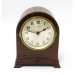 Bulle - Clock : A French Art Deco mahogany cased electric mantel clock by Bulle. model XC. Approx. 8