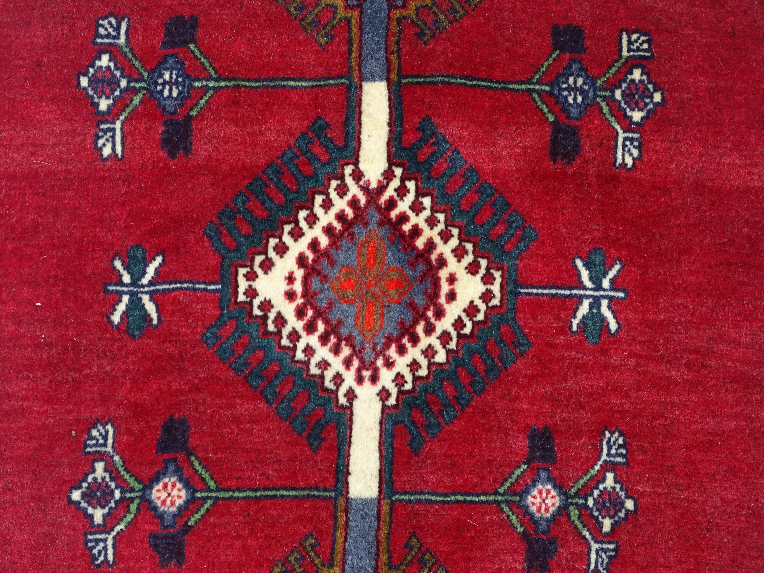 Carpet / Rug: A South West Persian Qashqai rug the red ground decorated with geometric motifs. - Image 6 of 9