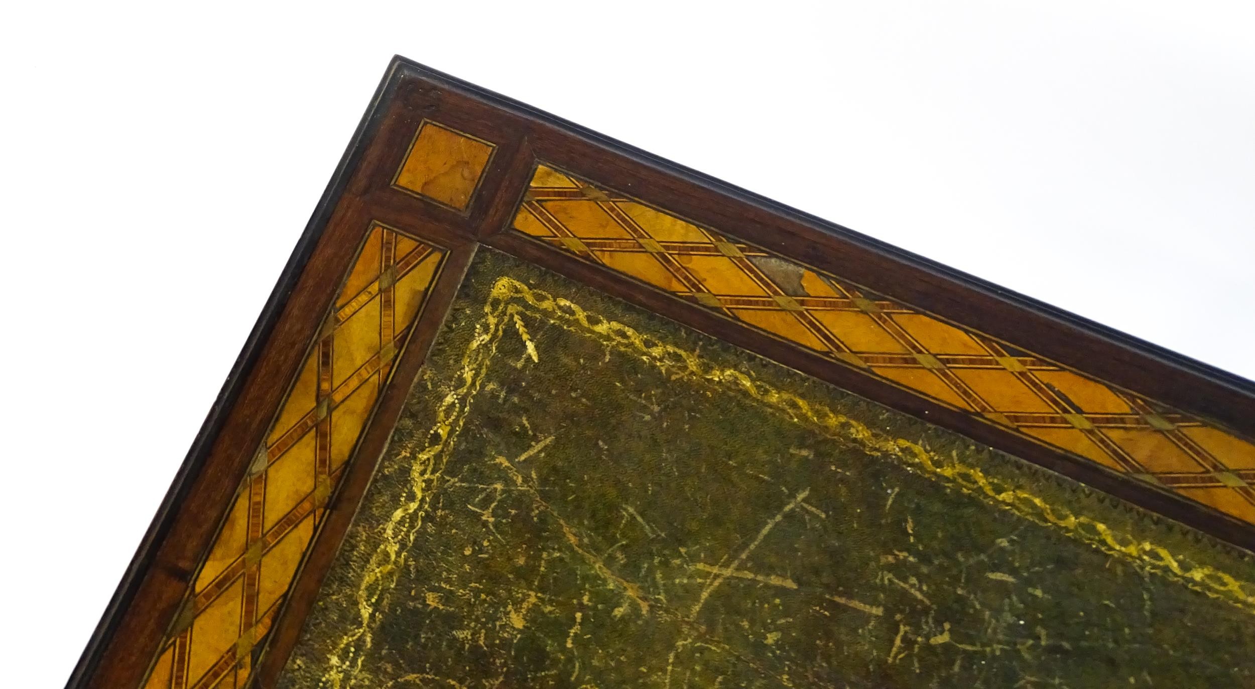 A 19thC side table with a satinwood inlaid top enclosing a gold tooled green leather top above a - Image 7 of 10