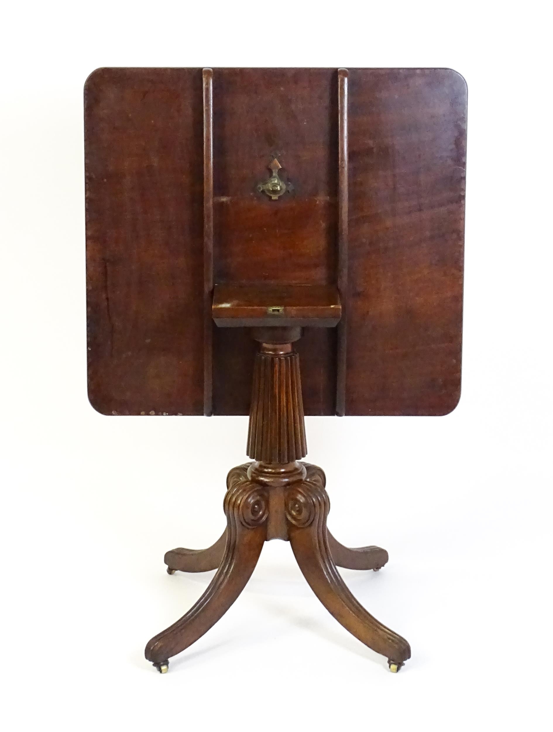 A 19thC mahogany occasional table, with a reeded tapering pedestal and raised on four reeded legs - Image 2 of 8