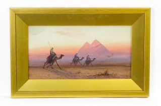 Douglas Houzen Pinder (1886-1949), Watercolour, A caravan of camels with Arab riders in the desert