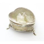 A silver ring box of heart form hallmarked Birmingham 1912, maker Synyer & Beddoes. Approx. 2 1/4"