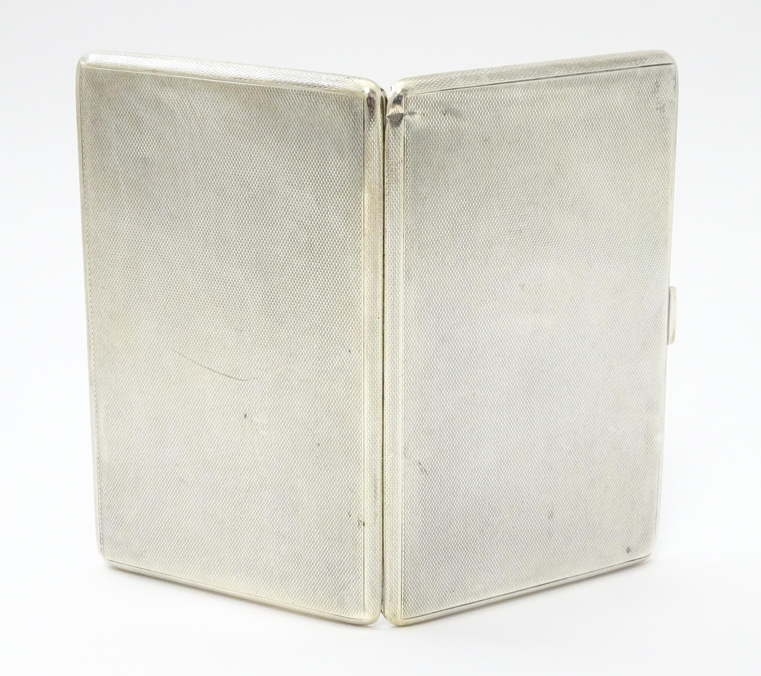 An Art Deco silver cigarette case with three sectional interior hallmarked Birmingham 1933, maker - Image 5 of 11