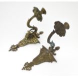 Two cast wall sconces with urn and rams head detail. Approx. 12" high (2) Please Note - we do not