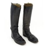 An early 20thC pair of black leather riding boots with trees, approx size 10 (2) Please Note - we do