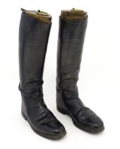 An early 20thC pair of black leather riding boots with trees, approx size 10 (2) Please Note - we do