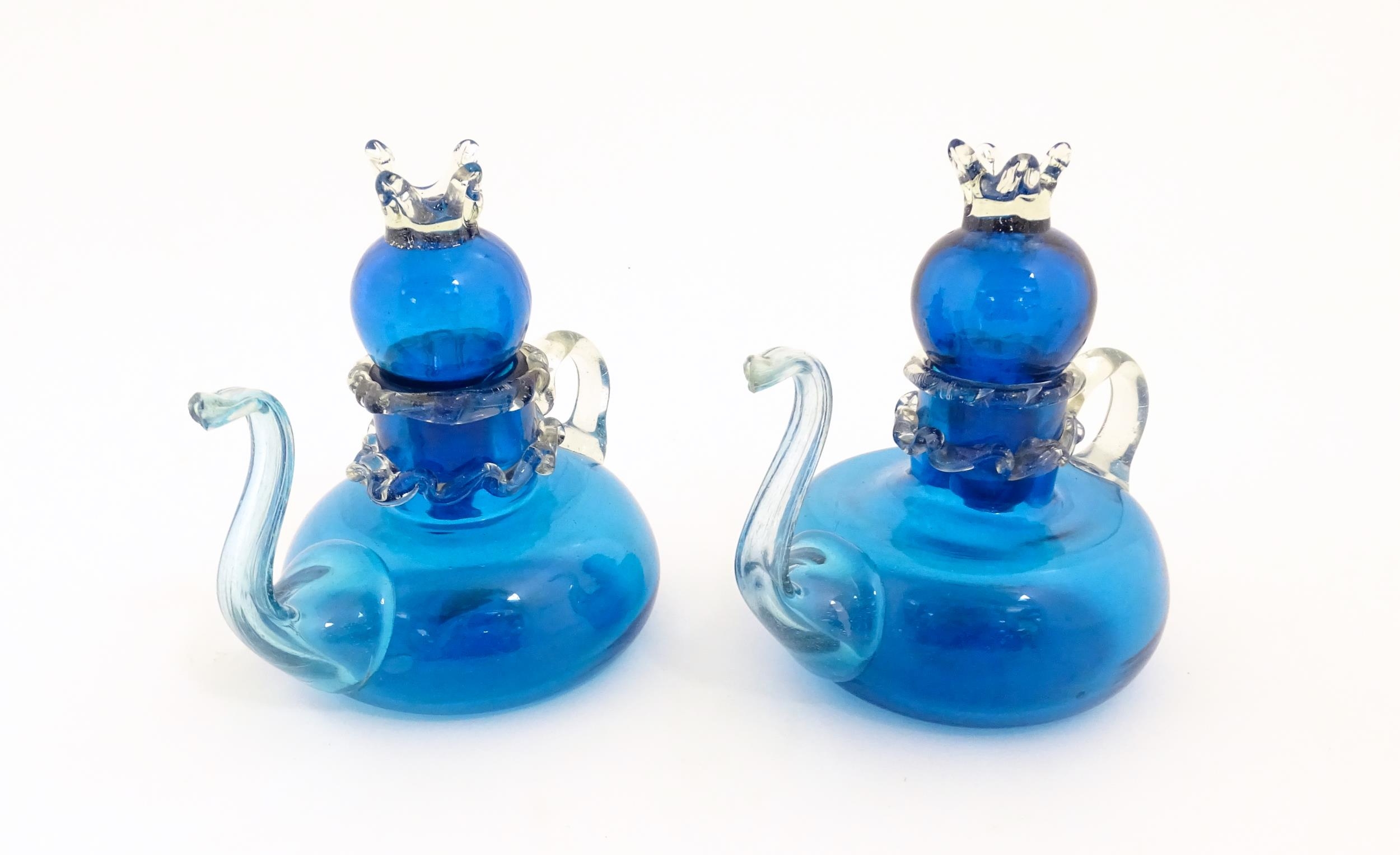 An unusual pair of turquoise glass oil / vinegar bottles of teapot form, the lids surmounted by - Image 5 of 11