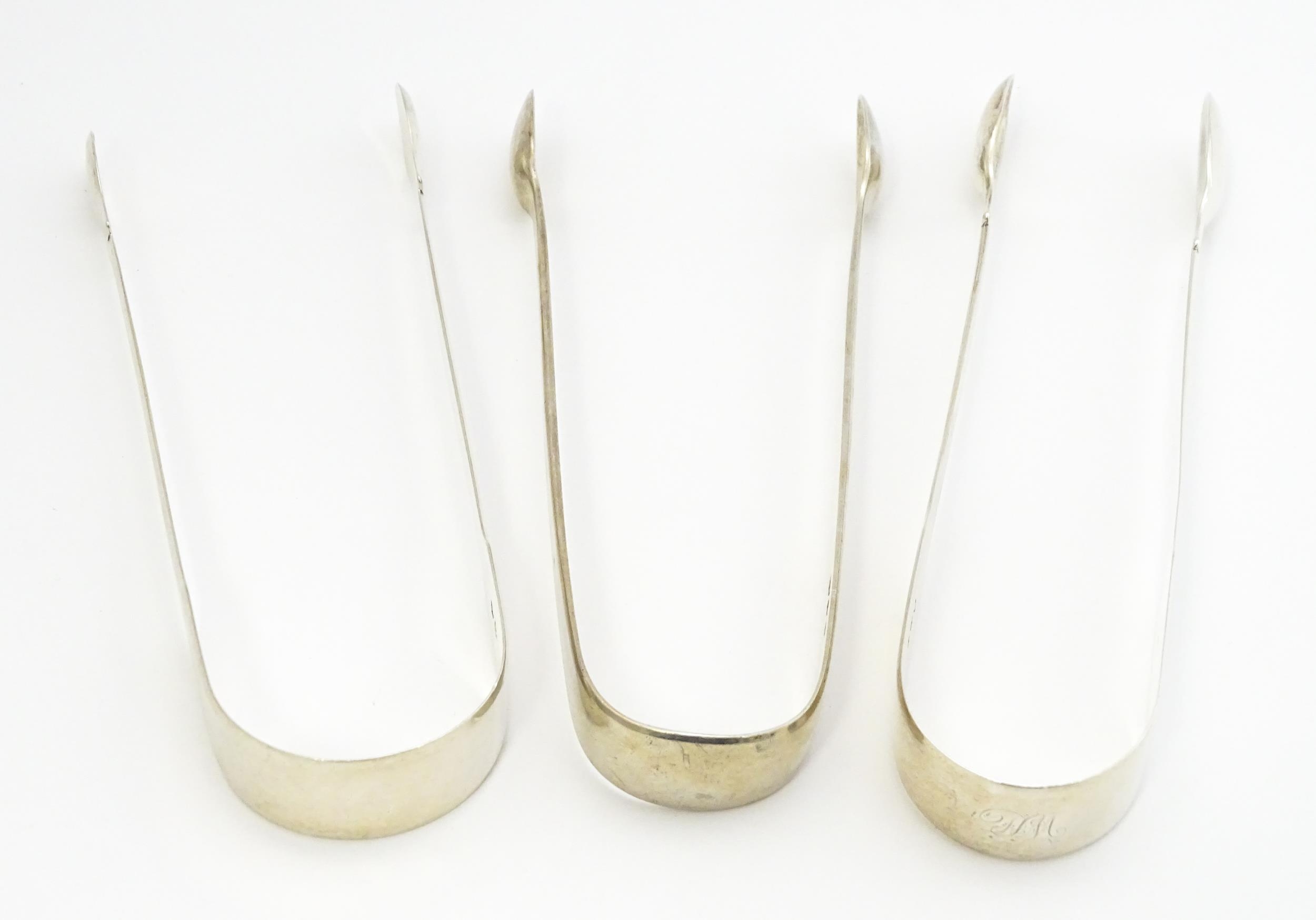 Three Georgian silver Fiddle and Old English pattern sugar tongs hallmarks to include London 1809, - Image 2 of 9