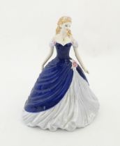 A Coalport limited edition lady Figuring of the Year 2008 Charlotte, no. 321 / 3000. Marked under.