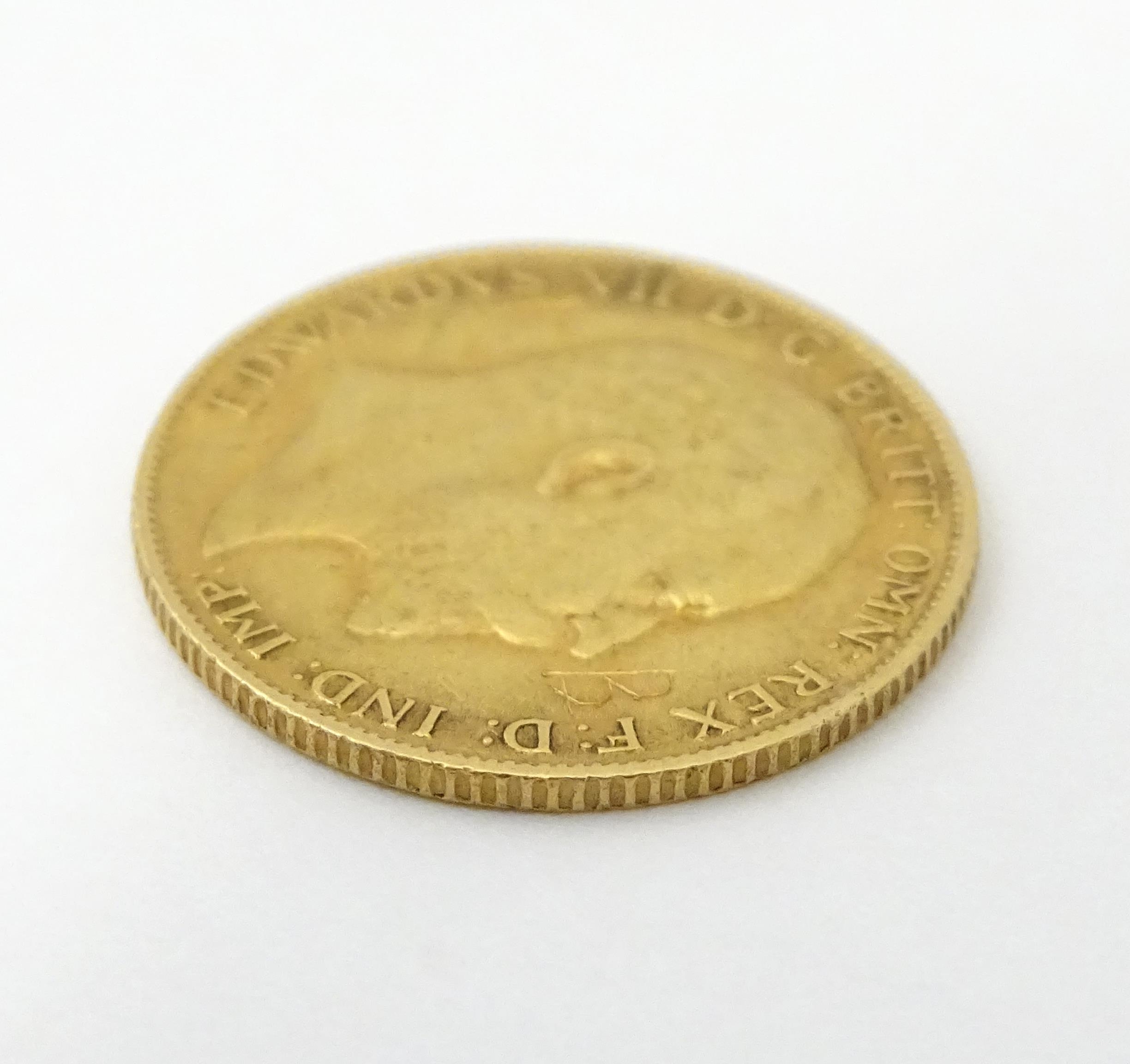 Coin: An Edward VII 1909 gold half sovereign (3.9g) Please Note - we do not make reference to the - Image 4 of 5