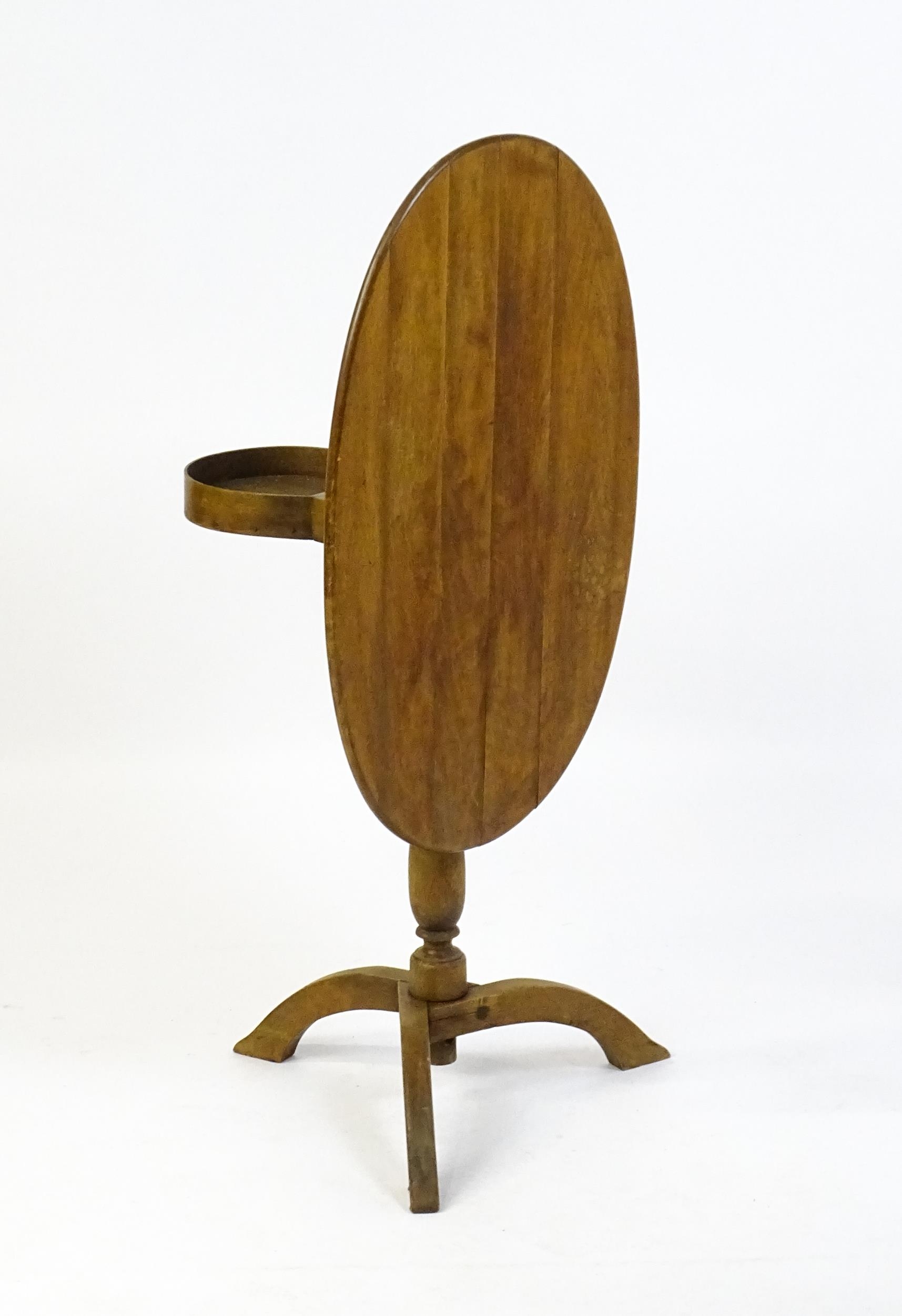 An early 20thC New England style occasional table, with an oval planked top, a storage compartment - Image 4 of 6